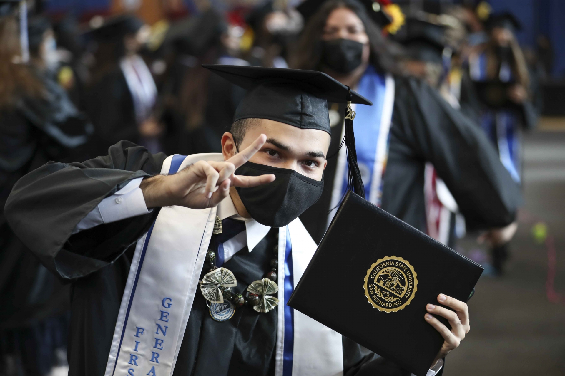 Student celebrating at Commencement 2021