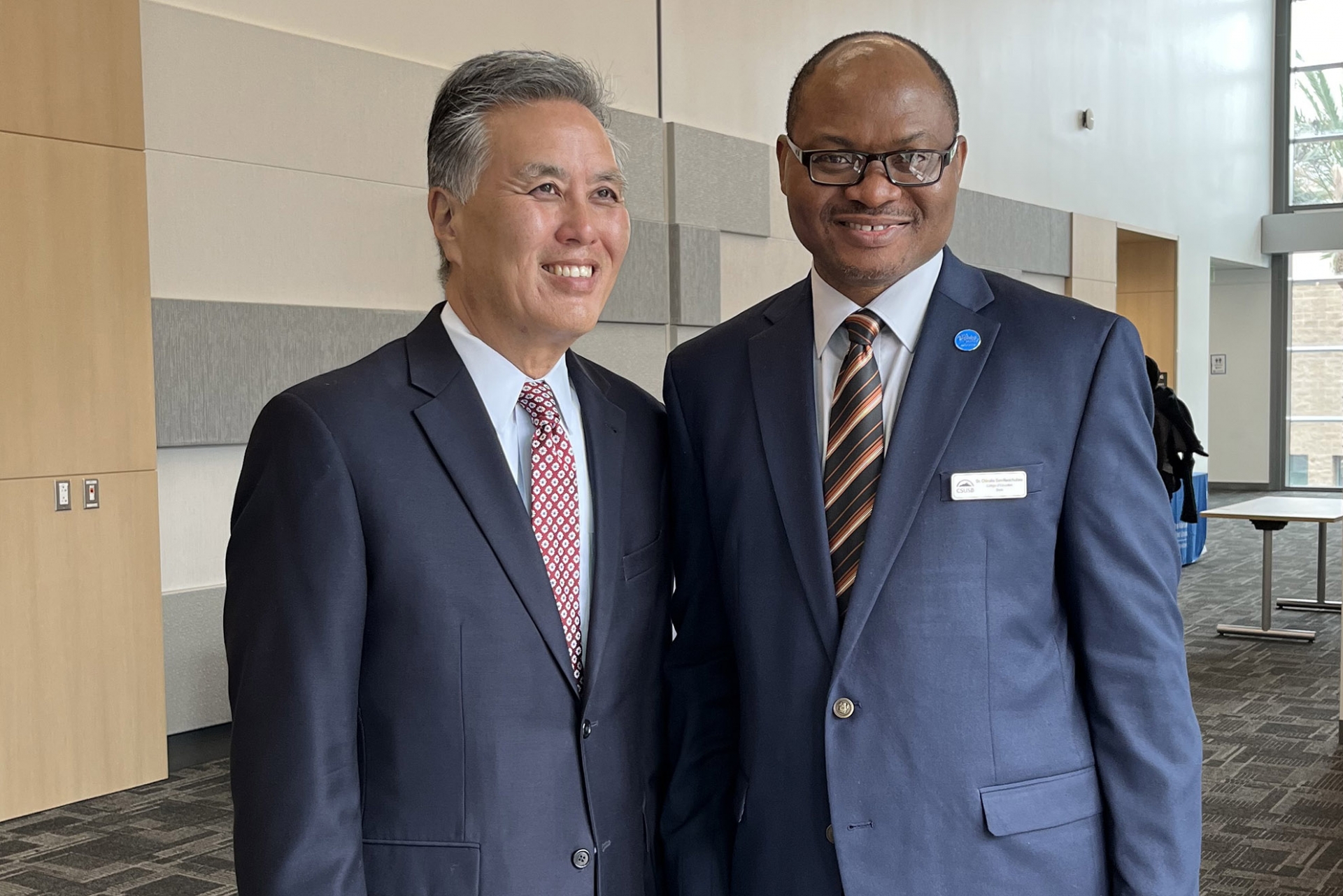 From left, Congressman Mark Takano and CSUSB Watson College of Education Dean Chinaka DomNwachukwu