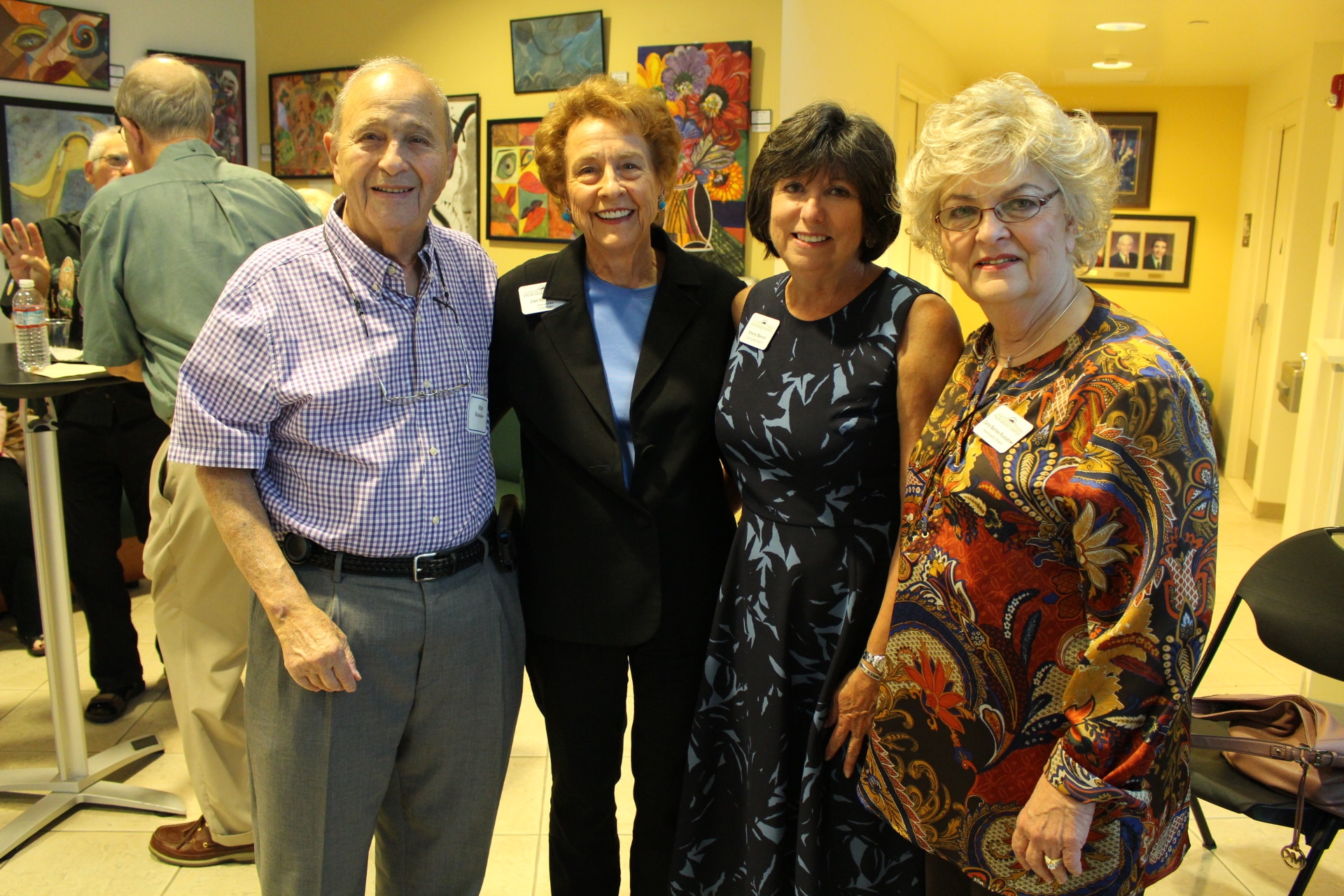 Associates members attend event in theater lobby