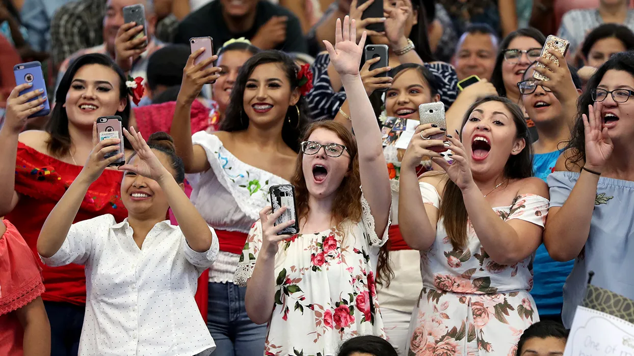 about 3,700 friends and family filled the CSUSB Coussoulis Arena for the Latino Graduation ceremony