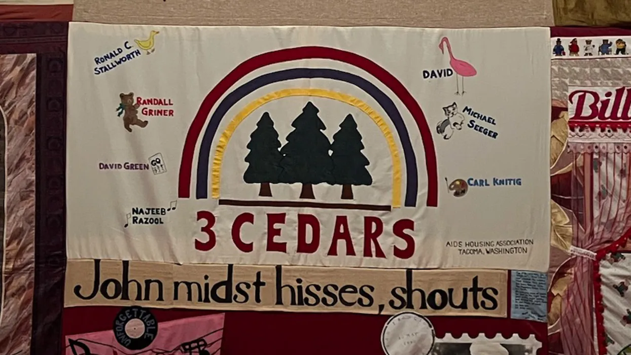 An image of a quilt honoring AIDS victims.