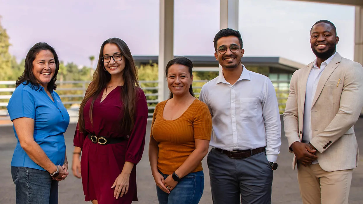 Tomás Gomez-Arias, dean of the Jack H. Brown College of Business and Public Administration (left) and student members of CSUSB’s Society for Human Resources Management leadership team.