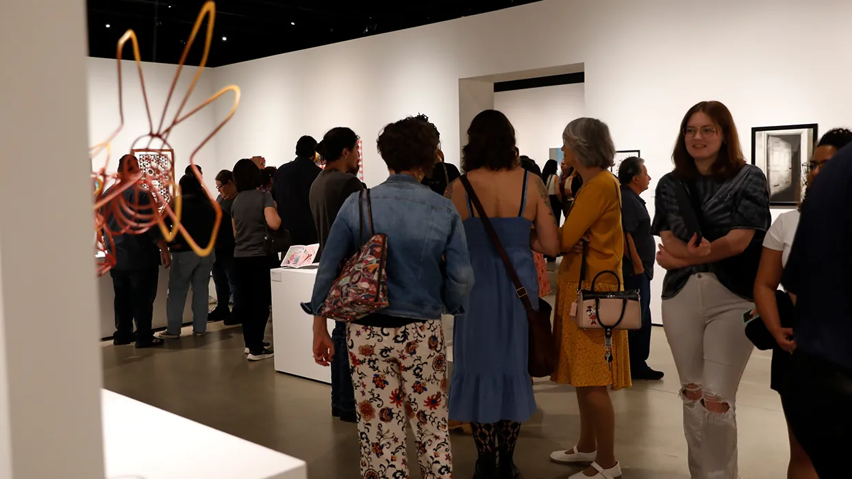 Attendees of the 52nd Annual Student Art Exhibition in spring 2024