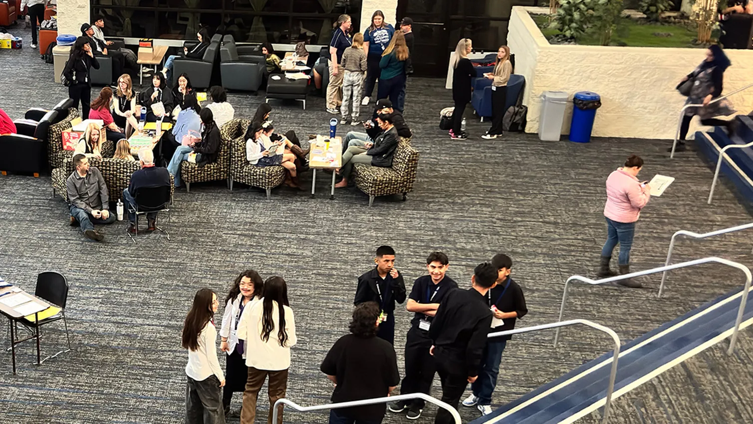 People gathered in the atrium of Santos Manuel Student Union-South for the 35th Annual History Day.
