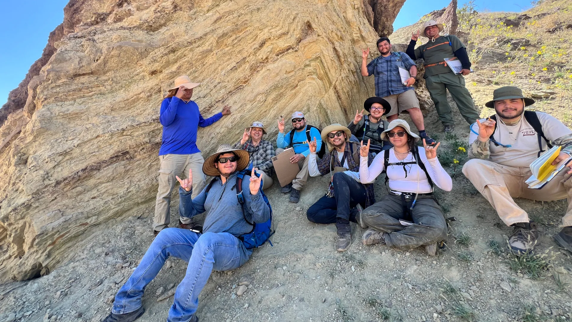 Geological sciences students studying rock formations