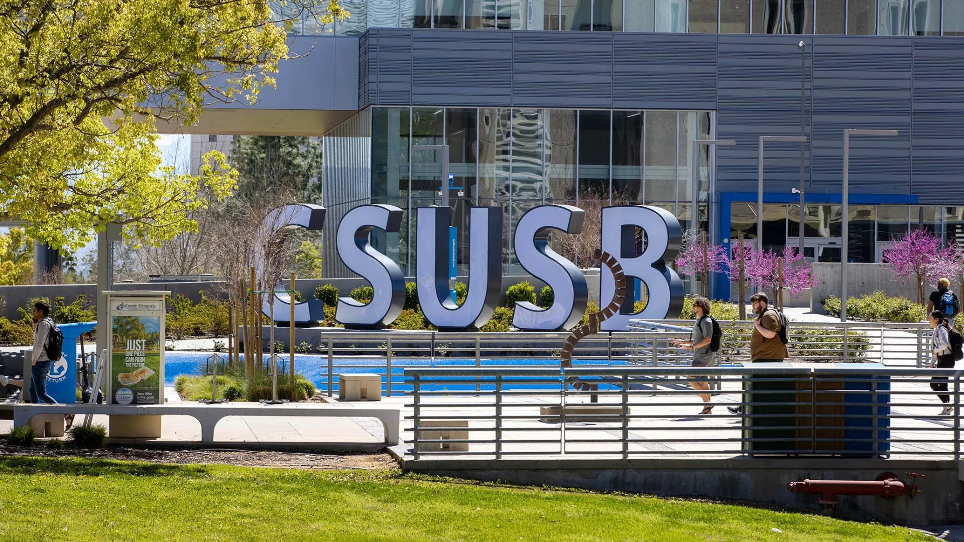 Students walking past the spirit letters near SMSU North.