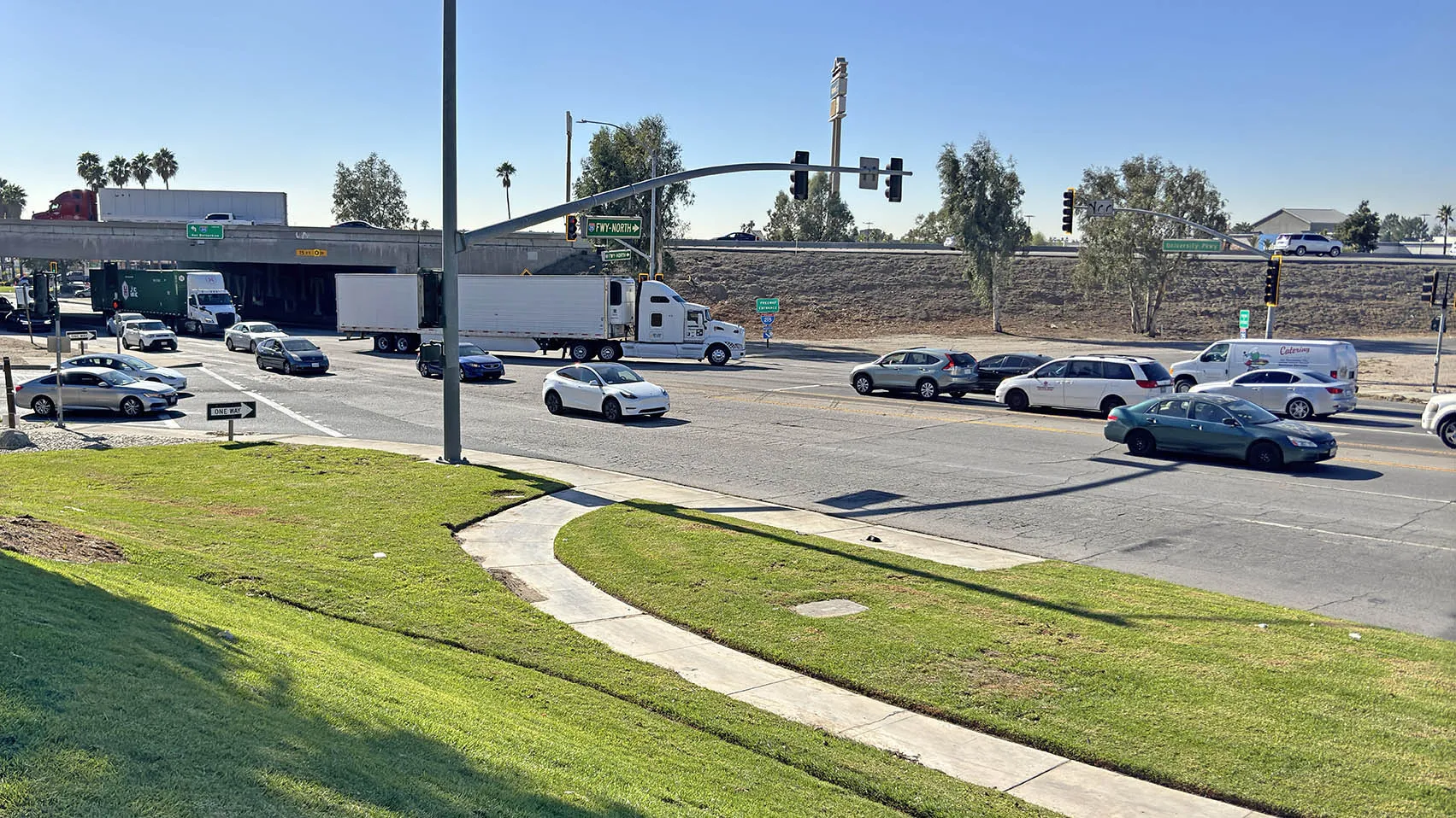 Traffic makes its way through University Parkway and Interstate 215. Work to improve the University Parkway-Interstate 215 interchange continues, and commuters who used the interchange to access the CSUSB campus should plan on alternate routes to avoid delays.