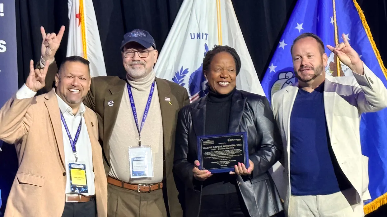 From left, event emcee Ralph Figueroa, conference co-organizer Tim Akers, keynote speaker Valerie Capers Workman, conference co-organizer Ryan Keating.