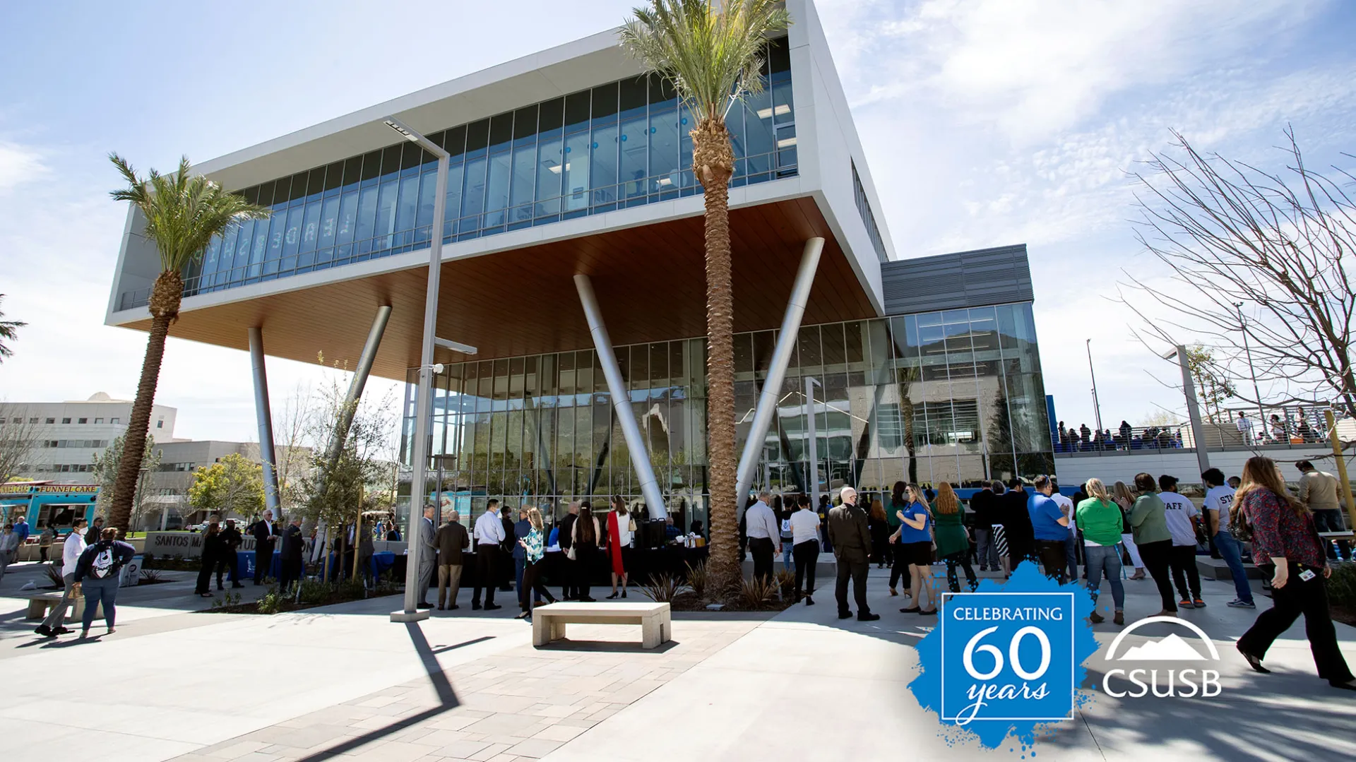 Students, faculty, staff and friends of the university attended the ribbon-cutting ceremony officially opening the Santos Manuel Student Union North in 2022.