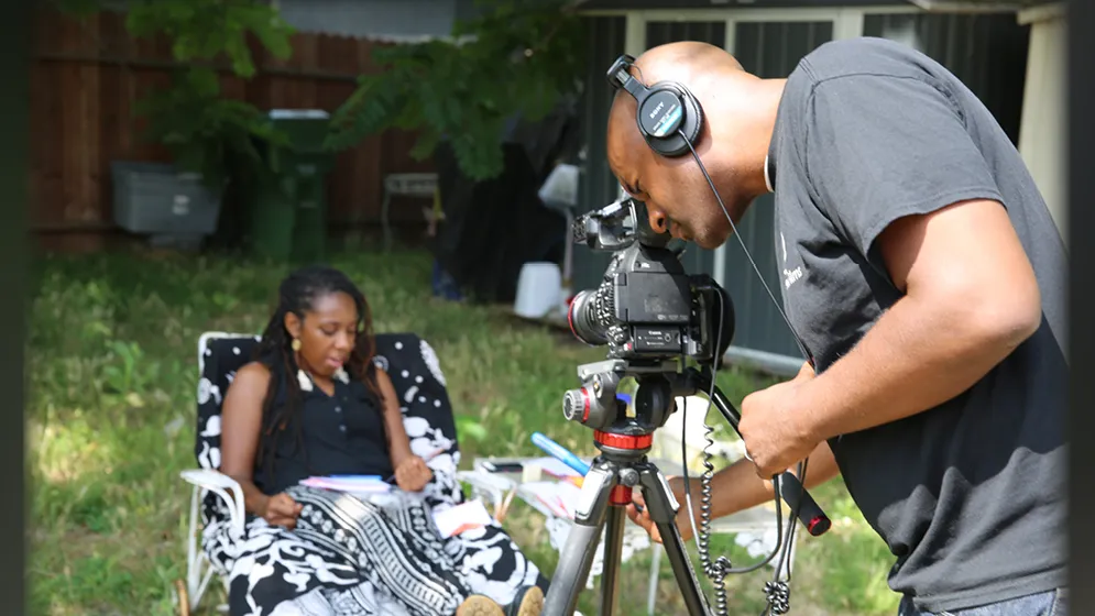CSUSB alumnus Jay Gerren (behind the camera), shoots a scene for one of his films.