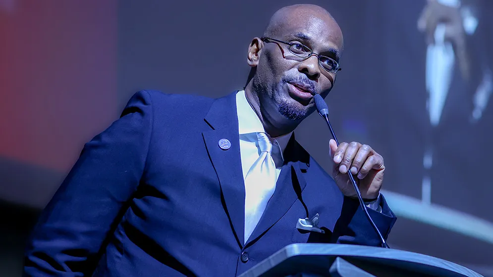 Kerry Neal, director of philanthropy at CSUSB, serves as the master of ceremony at the 10th annual Pioneer Breakfast in 2023. 