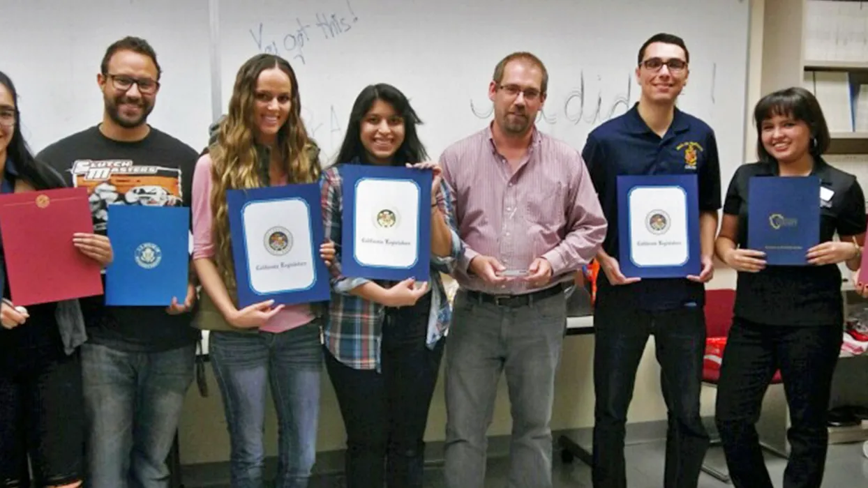 Mark Agars being recognized for volunteer work on behalf of the Community Action Partnership of San Bernardino County.