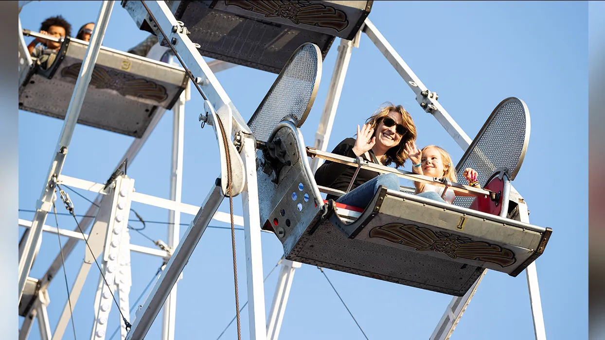 Guests enjoy the Ferris wheel at CSUSB’s Homecoming Bash