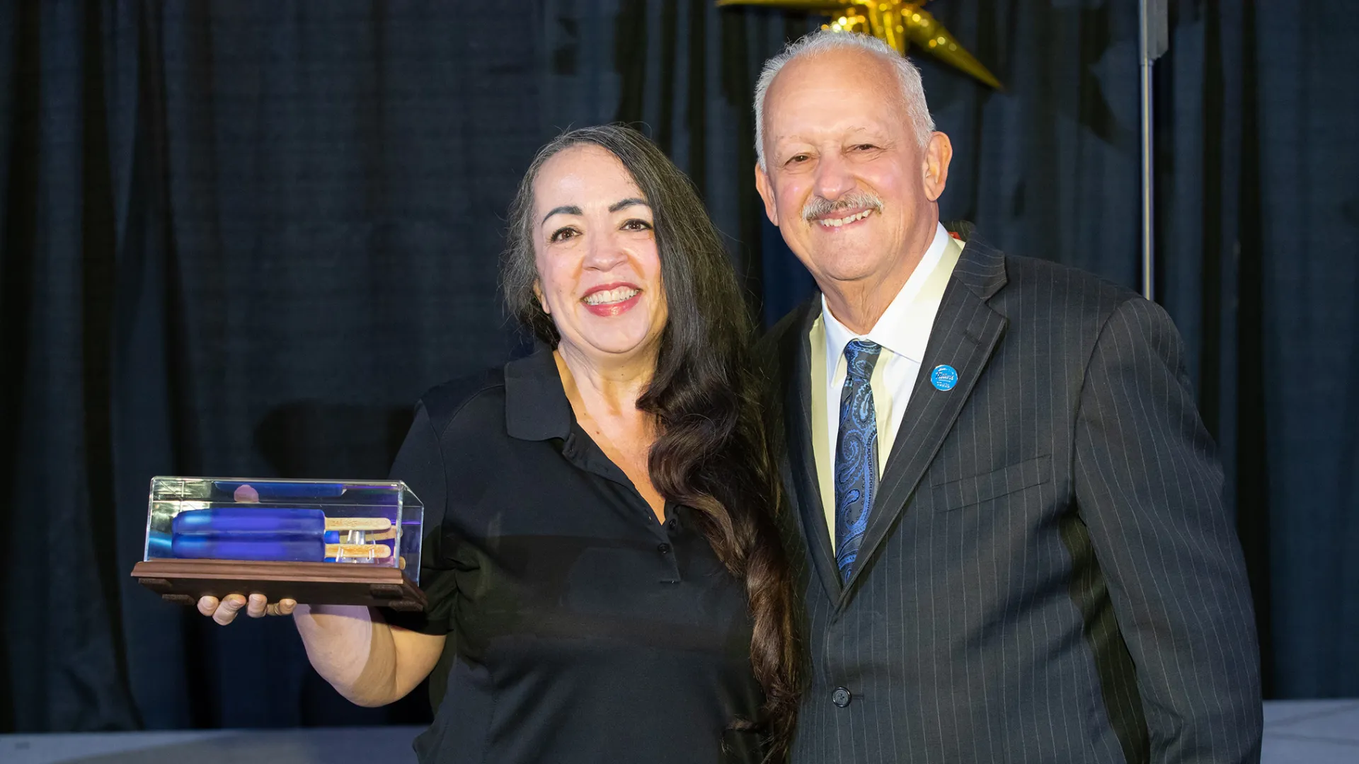 From left, Lisa Gordon, recipient of this year's Angie Award, with CSUSB President Tomás D. Morales