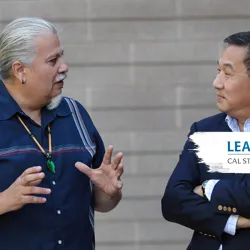 Enrique Murillo Jr. (l), Professor of education an executive director of LEAD, is interviewed by PBS NewsHour reporter John Yang