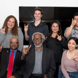 Sylvester James “Jim” Gates posing with CSUSB students and staff