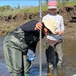 Students in the Field-based Learning, Outreach and Workforce Scholarship fellowship conduct water research.