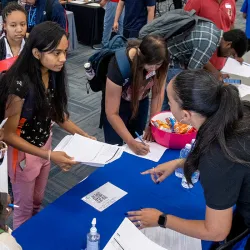 Students attend a fair to learn about the resources available to them.