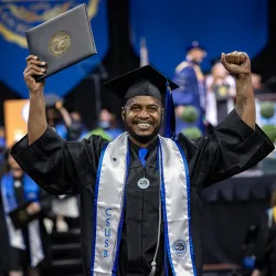 A student celebrates at the spring 2024 Commencement ceremony. CSUSB was ranked No. 3 in the nation for social mobility in The Wall Street Journal’s Best Colleges 2025 list.