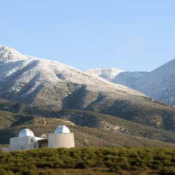 Snow covers the mountains above CSUSB’s Murillo Family Observatory. The university will be closed Dec. 24-Jan. 1 for winter break.