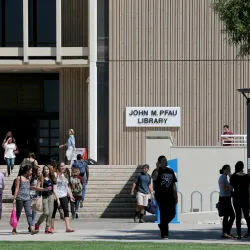 Students outside CSUSB's John M. Pfau Library.