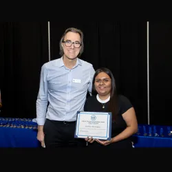 Jordi Solsona-Puig (left), assistant professor and co-coordinator of the Bilingual Authorization in Spanish program, and Jocelyn Hernandez-Rosales, the James R. Watson and Judy Rodriguez Watson College of Education’s 2025 Outstanding Bilingual Student.