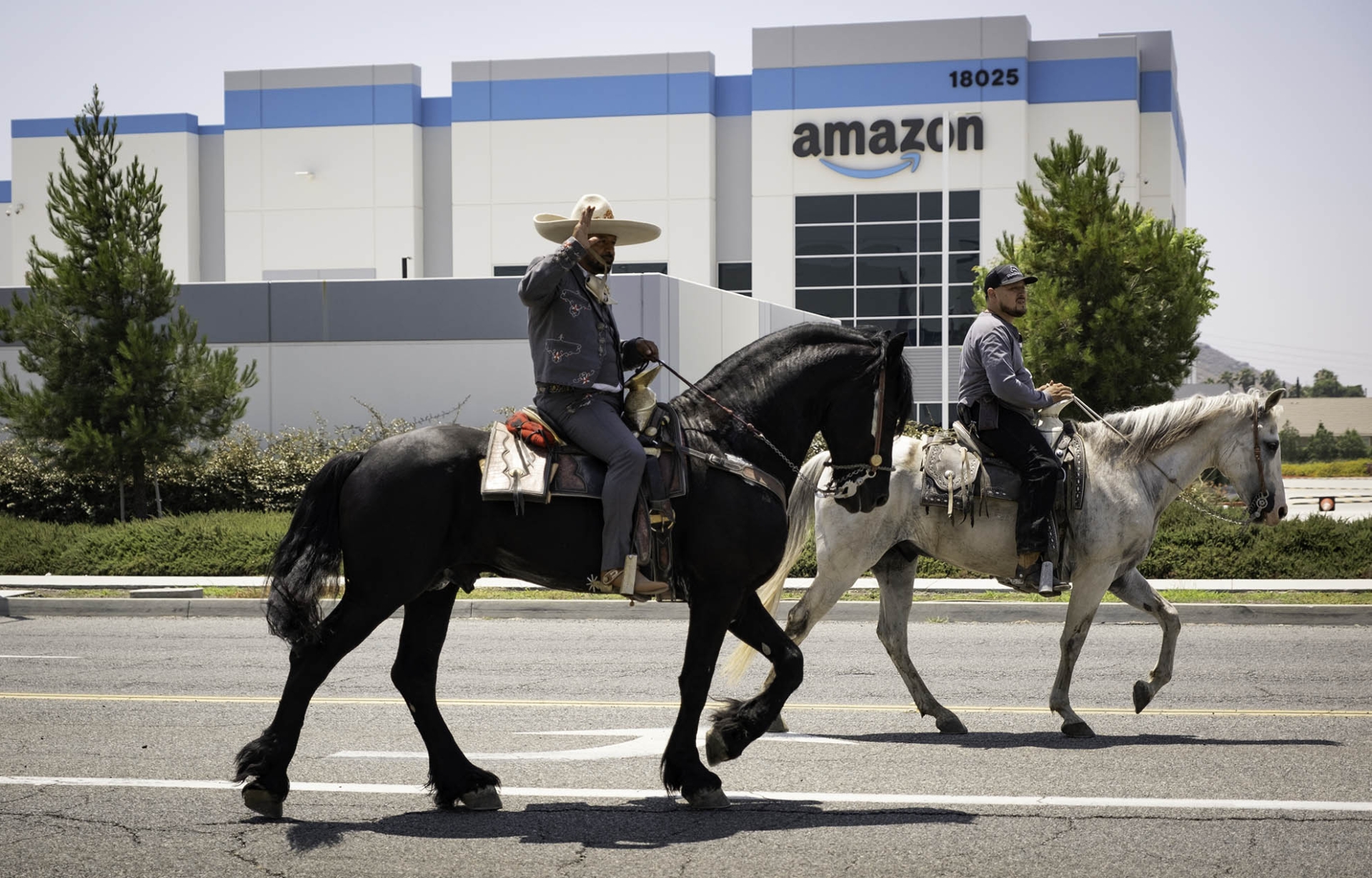 “Cabalgata (horse parade) to protest warehouse development,” Bloomington, Calif., July 2024, photo by Fernanda Durazo, courtesy of A People's History of the I.E