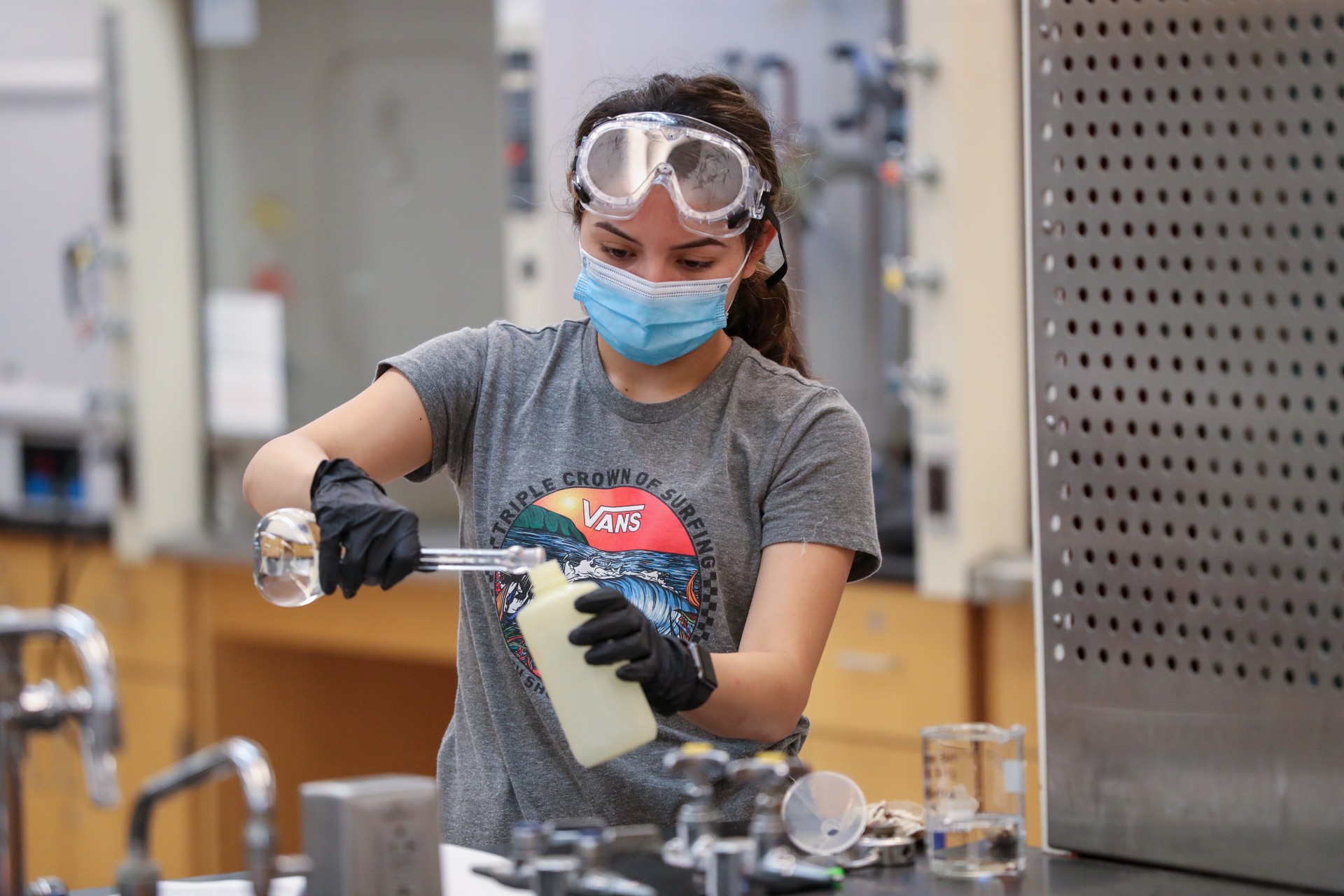 Student conducting a science experiment