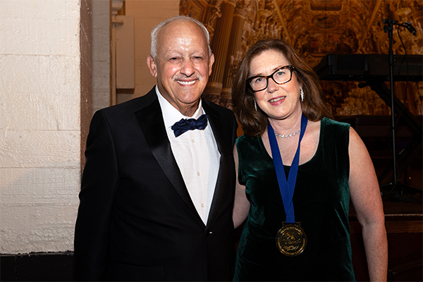 CSUSB President Tomás D. Morales (left) presented the California State University, San Bernardino President’s Medal to Michelle Decker on Dec. 7.