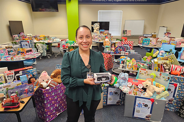 Dora Mejia, manager for Emergency Management & Business Continuity at University Police Department, supported and promoted the Annual Toy Drive.