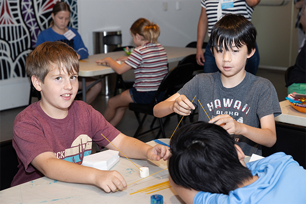 Children participate in workshop activities.
