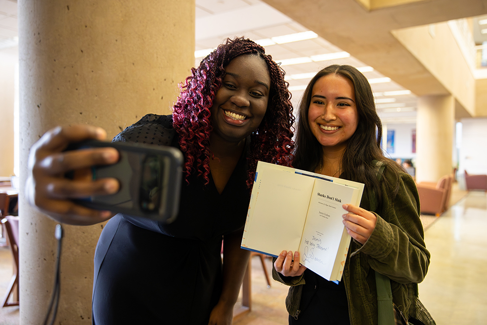 Graham took selfies with CSUSB students at her book giveaway and signing.