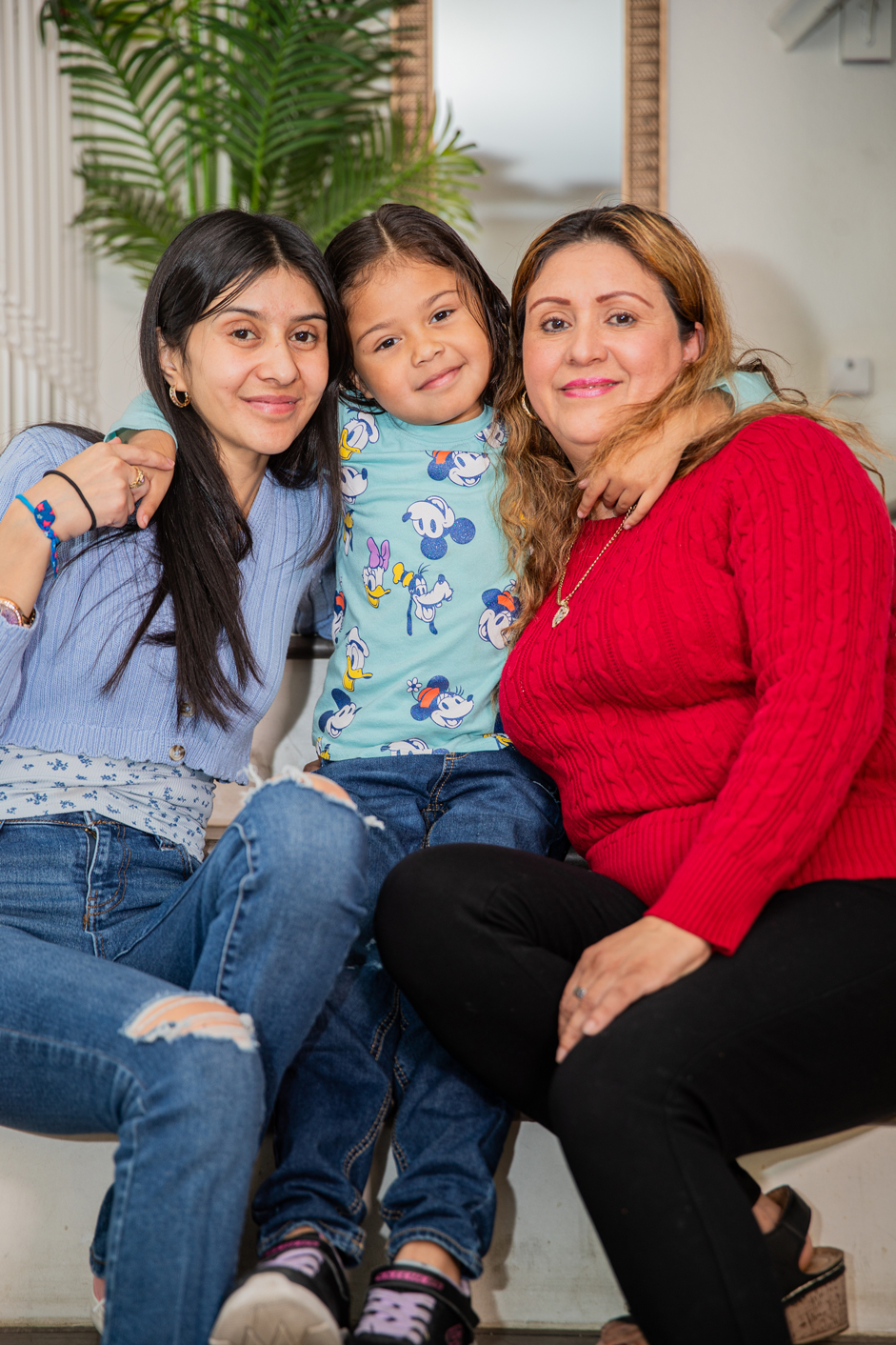 Jennifer Cornejo, left, with her daughter, Melody, and her mother
