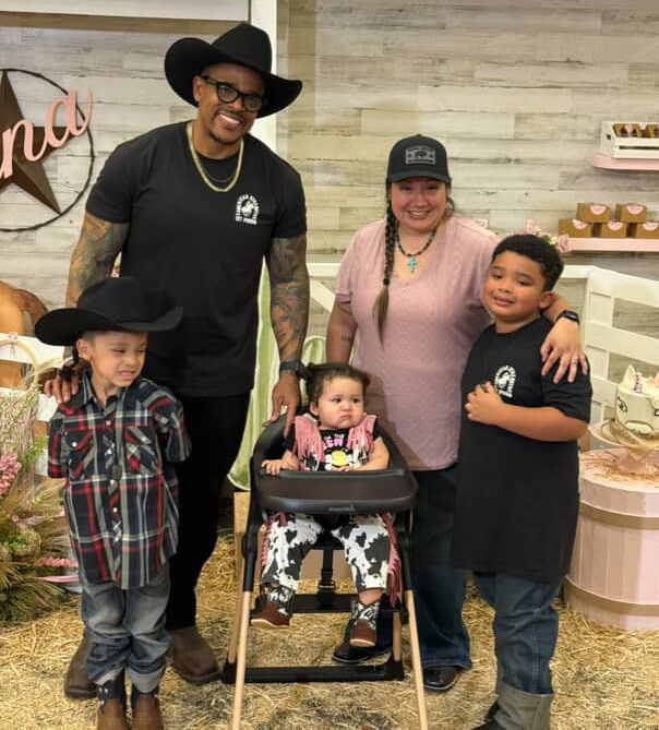 Bolden poses with her family.