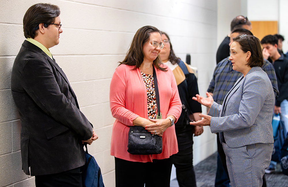 Caroline Vickers, dean of the University Honors College, greeted prospective scholars and their families before the dinner.&nbsp;