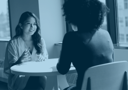 Two colleagues holding a conversation.