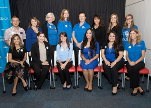 SDC committee members pose for a group photo at the grand opening